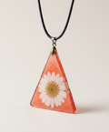 Colgante de resina con flor